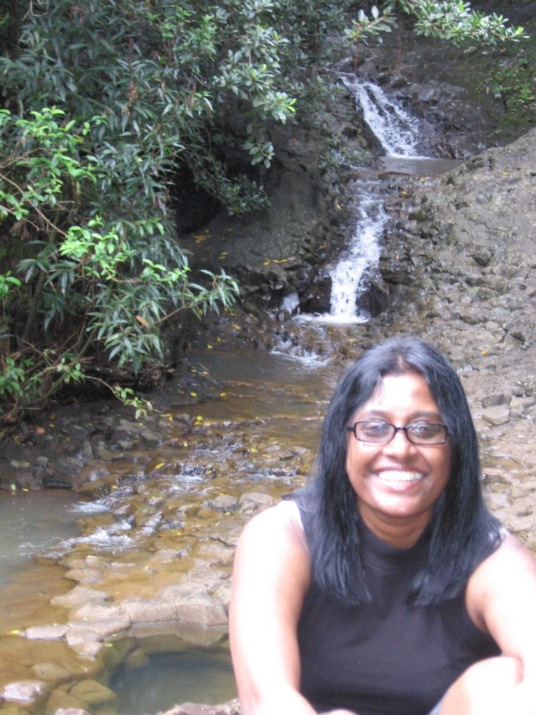 Premila at waterfall on the road to Hana